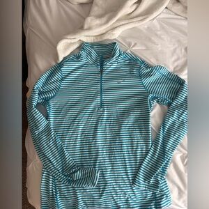 Nike running quarter-zip with thumb holes. Great for running or exercise!